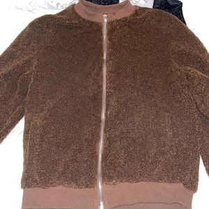 brown zip up jacket